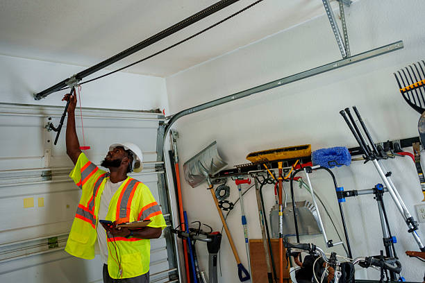 Professional Garage Door Maintenance technician working in Ironwood, MI